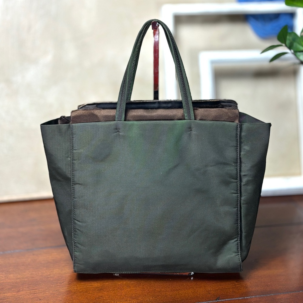 AUTHENTIC Prada bag. Green with brown silk interior.